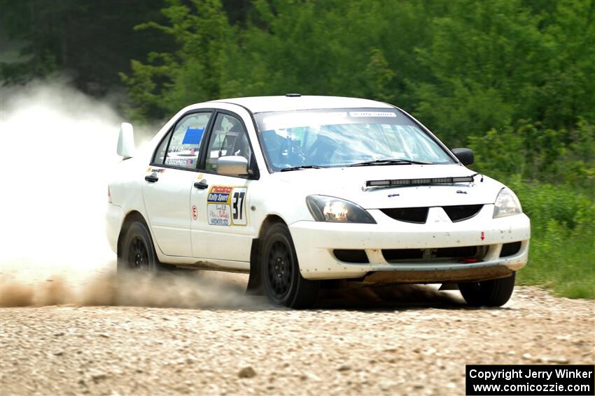 Andrew Bockheim / Salvatore LoPresti Mitsubishi Lancer on SS1, Camp 3 North.