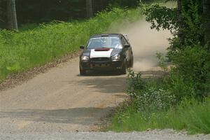 Mike Ryan's Subaru Impreza 2.5RS on SS1, Camp 3 North.