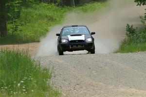 Mike Ryan's Subaru Impreza 2.5RS on SS1, Camp 3 North.