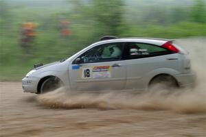 Srikanth Nayini / Otis Lee Miller Ford Focus SVT slides to a stop on SS2, Skunk Creek.