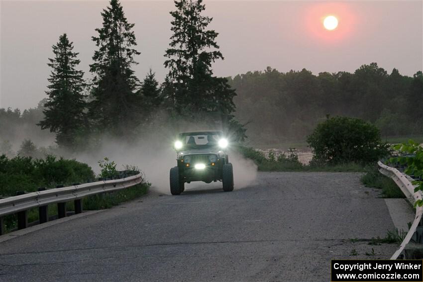 A Jeep Wrangler sweeps SS6, Camp 3 South.