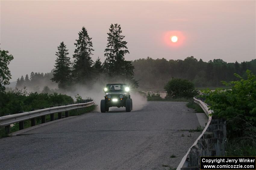 A Jeep Wrangler sweeps SS6, Camp 3 South.