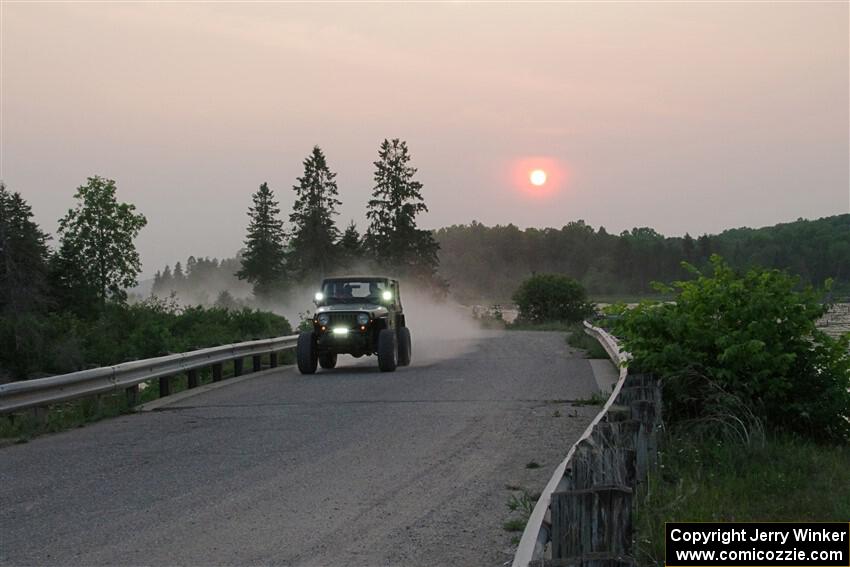 A Jeep Wrangler sweeps SS6, Camp 3 South.