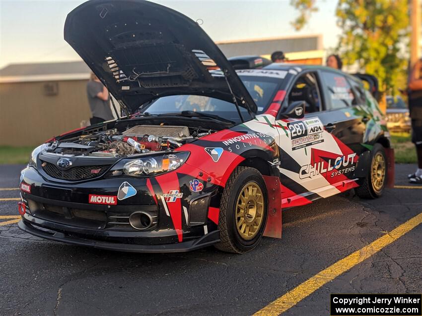 Brian Mbuvi / Alex Ferencz Subaru WRX STi at Thursday evening's parc expose.