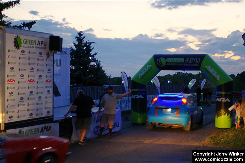 Chris Miller / Crystina Coats Ford Focus ZX3 at Thursday night's ceremonial start.