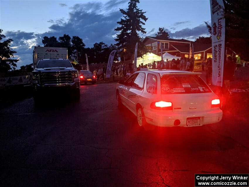 Aidan Hicks / John Hicks Subaru Impreza Wagon lined up for Thursday night's ceremonial start.