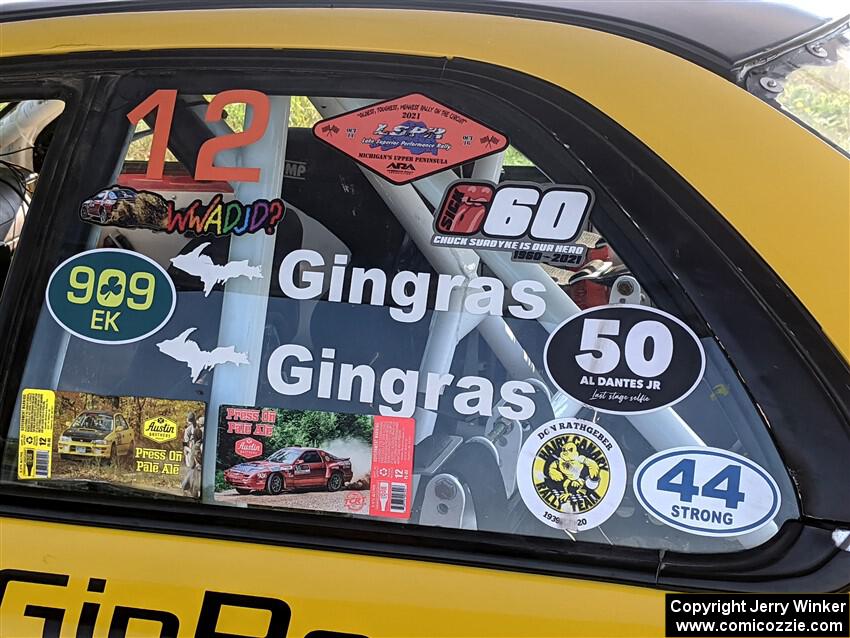 Various tribute stickers on the Steve Gingras / Katie Gingras Subaru Impreza.