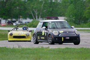 Tim Little's B-Spec MINI Cooper and Brooke Fairbanks' H Production Triumph Spitfire