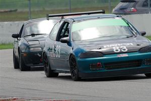 Mark Utecht's ITJ Honda Civic and Sam Nogosek's Spec Miata Mazda