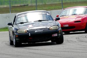 Mike Soward's and Eric Chang's Spec Miata Mazda Miatas