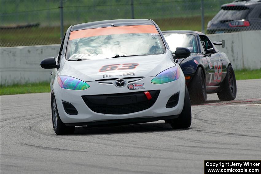 Bill Collins' B-Spec Mazda 2 and Cody Lindman's STL Mazda Miata