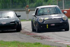 Tim Little's B-Spec MINI Cooper and Sam Nogosek's Spec Miata Mazda