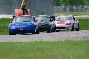 Gordon Kuhnley's, Sam Nogosek's and Kyle Greenhill's Spec Miata Mazda Miatas