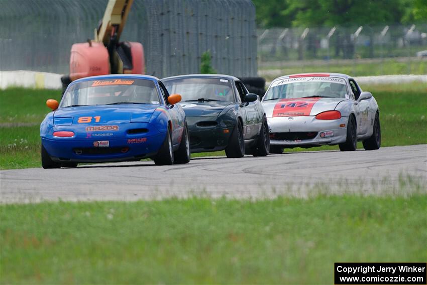 Gordon Kuhnley's, Sam Nogosek's and Kyle Greenhill's Spec Miata Mazda Miatas