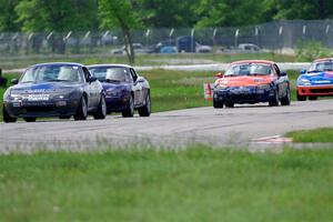 Aaron Jongbloedt's, Geoff Youngdahl's and Nick LoGalbo's Spec Miata Mazda Miatas