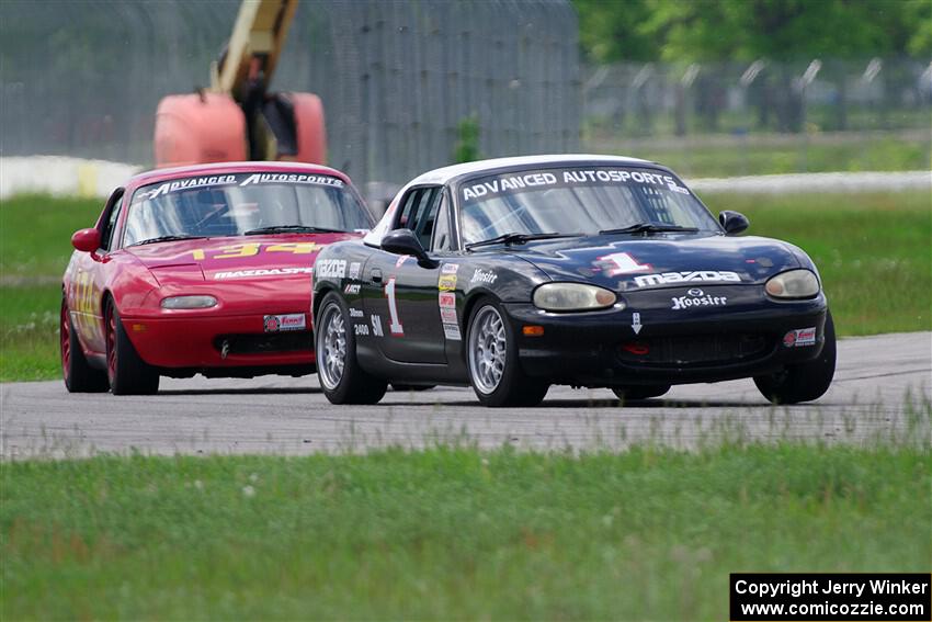 Mike Soward's and Eric Chang's Spec Miata Mazda Miatas