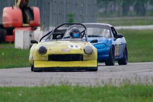 Brooke Fairbanks' H Production Triumph Spitfire and Rick Buan's Spec Miata Mazda Miata