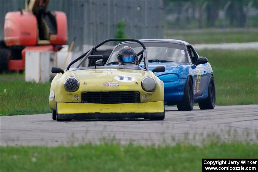 Brooke Fairbanks' H Production Triumph Spitfire and Rick Buan's Spec Miata Mazda Miata