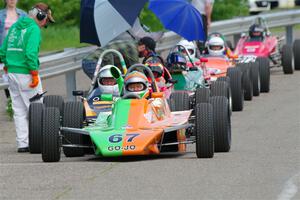 John Hogdal's Citation-Zink Z-16 Formula Ford heads the vintage open-wheel group on the false grid.