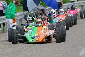 John Hogdal's Citation-Zink Z-16 Formula Ford heads the vintage open-wheel group on the false grid.