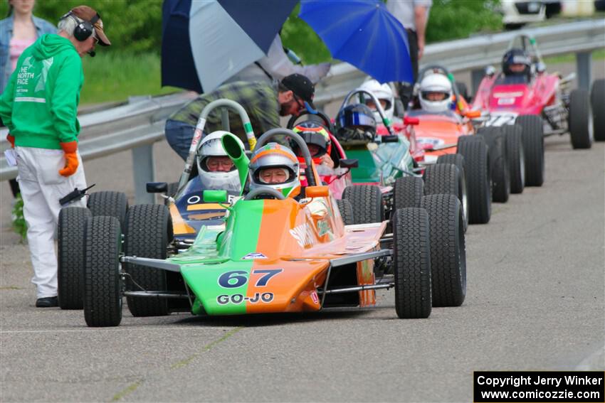 John Hogdal's Citation-Zink Z-16 Formula Ford heads the vintage open-wheel group on the false grid.