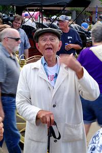 One of the drivers poses in period gear.