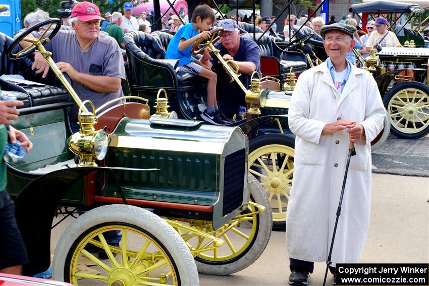 One of the drivers poses in period gear.