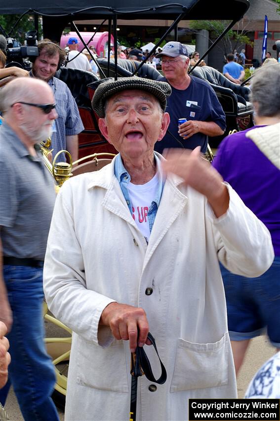 One of the drivers poses in period gear.