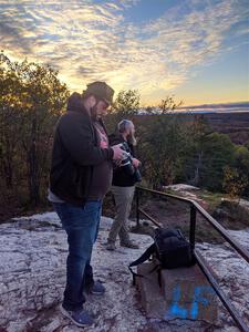 Tim Jarvis and John Ruschmeyer take a few photos atop Mount Marquette.