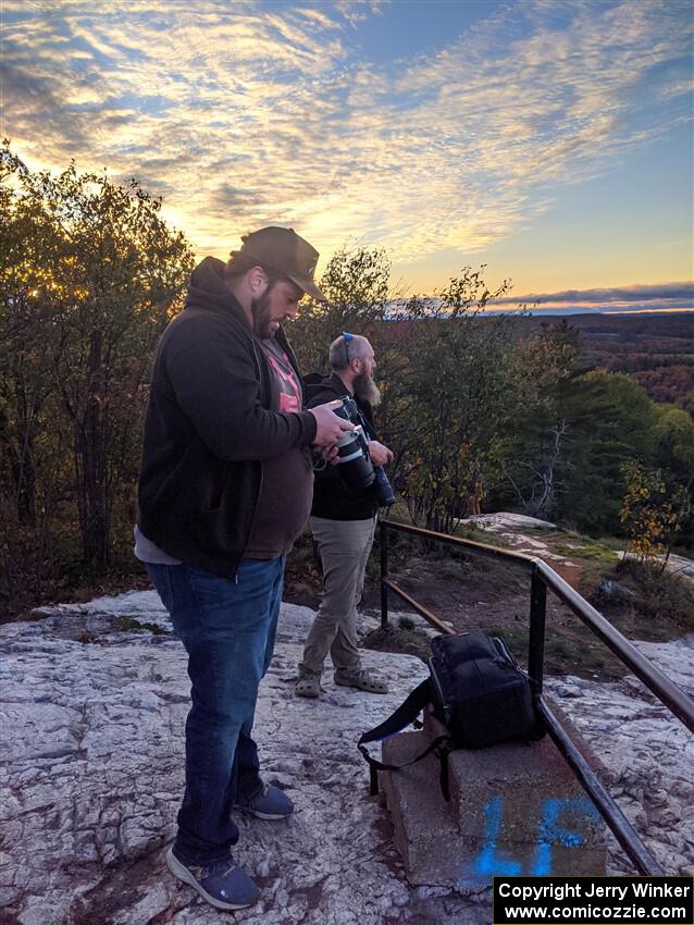 Tim Jarvis and John Ruschmeyer take a few photos atop Mount Marquette.