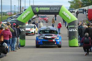 Arek Bialobrzeski / Aris Mantopoulos Subaru WRX STi leaves the ceremonial start.