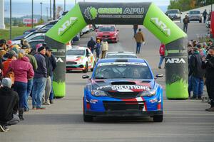 Arek Bialobrzeski / Aris Mantopoulos Subaru WRX STi leaves the ceremonial start.