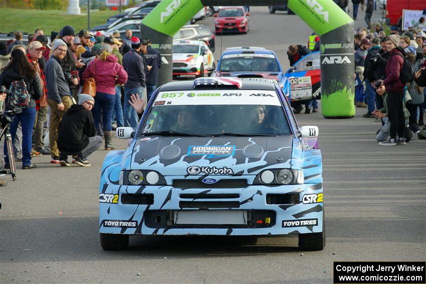 Lia Block / Rhianon Gelsomino Ford Escort Cosworth RS leaves the ceremonial start.