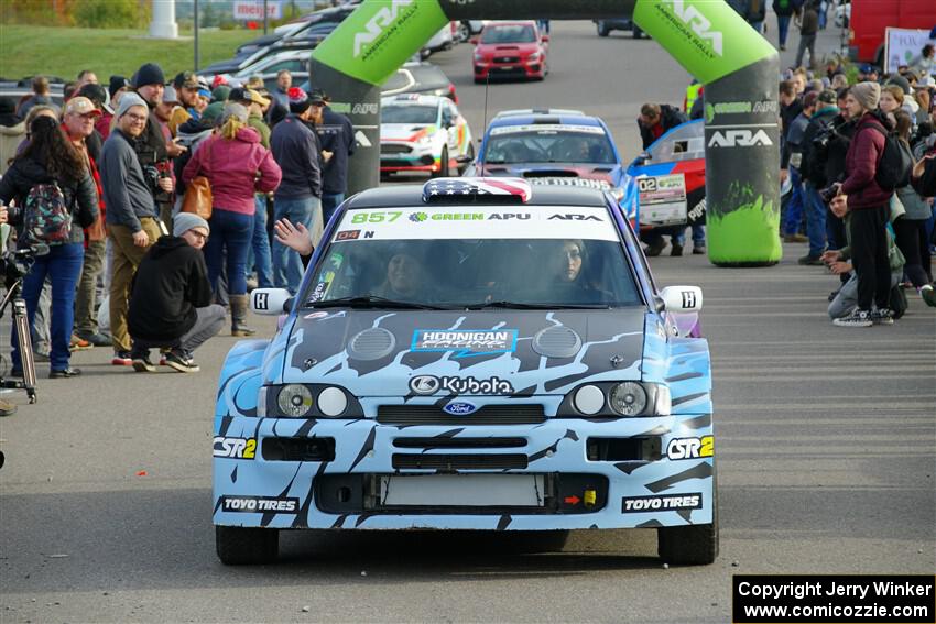 Lia Block / Rhianon Gelsomino Ford Escort Cosworth RS leaves the ceremonial start.