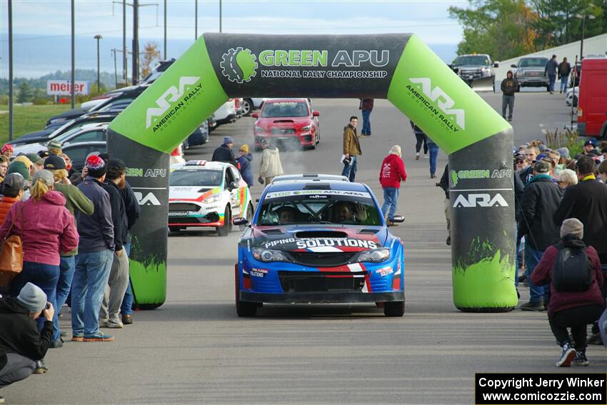 Arek Bialobrzeski / Aris Mantopoulos Subaru WRX STi leaves the ceremonial start.