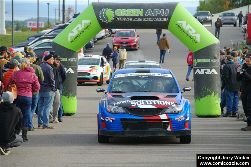 Arek Bialobrzeski / Aris Mantopoulos Subaru WRX STi leaves the ceremonial start.