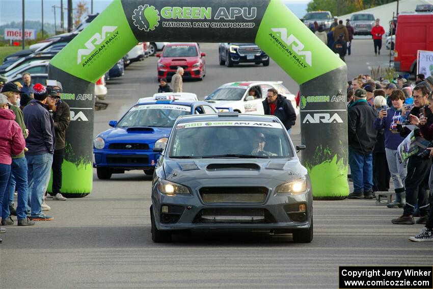 Zach Jacques / Ron Jacques Subaru WRX STi leaves the ceremonial start.