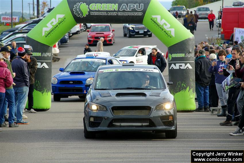 Zach Jacques / Ron Jacques Subaru WRX STi leaves the ceremonial start.