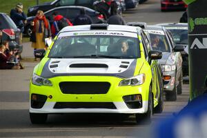 Tim Rooney / Claudia Barbera-Pullen Subaru WRX STi leaves the ceremonial start.