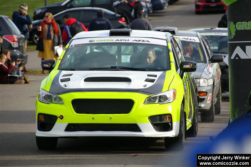 Tim Rooney / Claudia Barbera-Pullen Subaru WRX STi leaves the ceremonial start.