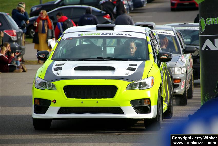 Tim Rooney / Claudia Barbera-Pullen Subaru WRX STi leaves the ceremonial start.