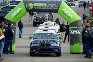 Ryan George / Heather Stieber-George BMW M3 leaves the ceremonial start.