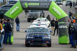 Ryan George / Heather Stieber-George BMW M3 leaves the ceremonial start.