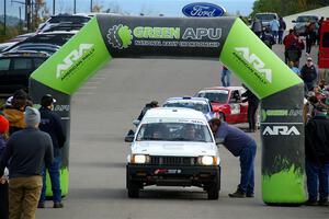 Steven Olona / Lauren Olona Toyota Tercel RWD leaves the ceremonial start.