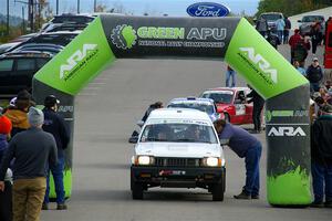 Steven Olona / Lauren Olona Toyota Tercel RWD leaves the ceremonial start.