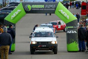 Steven Olona / Lauren Olona Toyota Tercel RWD leaves the ceremonial start.