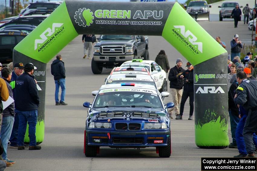 Ryan George / Heather Stieber-George BMW M3 leaves the ceremonial start.