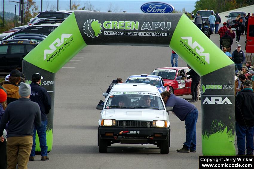 Steven Olona / Lauren Olona Toyota Tercel RWD leaves the ceremonial start.