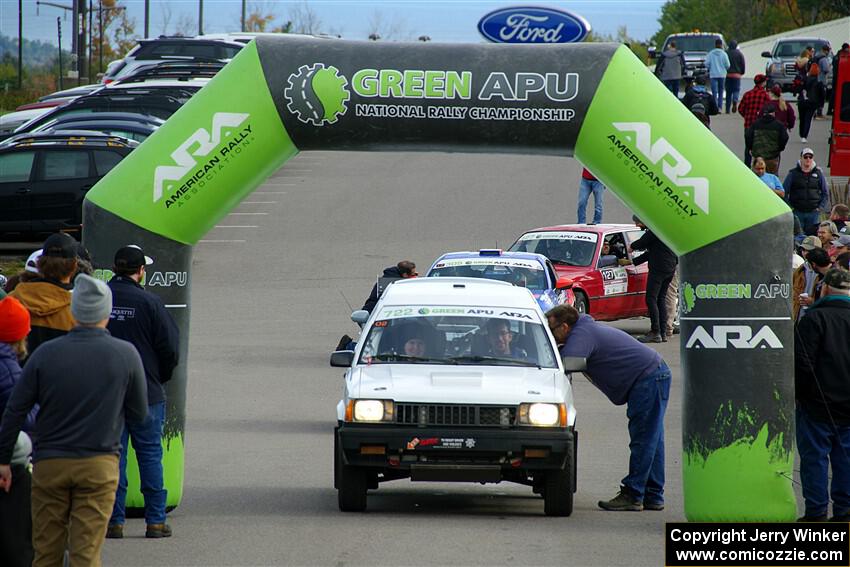 Steven Olona / Lauren Olona Toyota Tercel RWD leaves the ceremonial start.