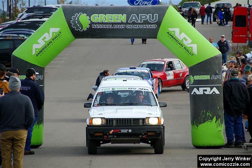 Steven Olona / Lauren Olona Toyota Tercel RWD leaves the ceremonial start.